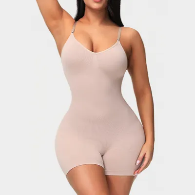 Beige skulpturel jumpsuit med stropper